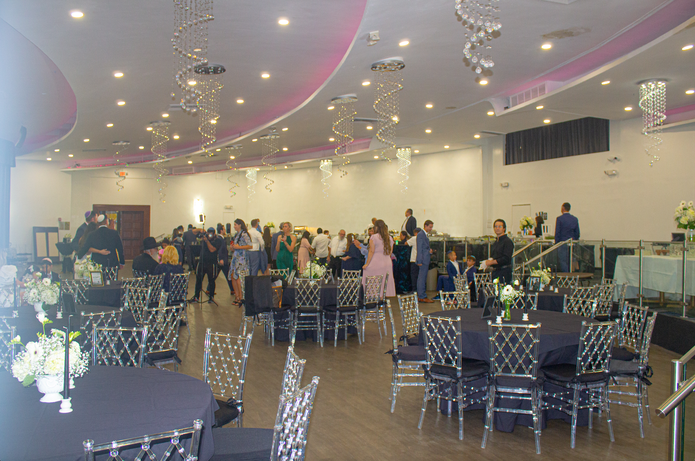 Event space decorated with color globes tables and chairs
