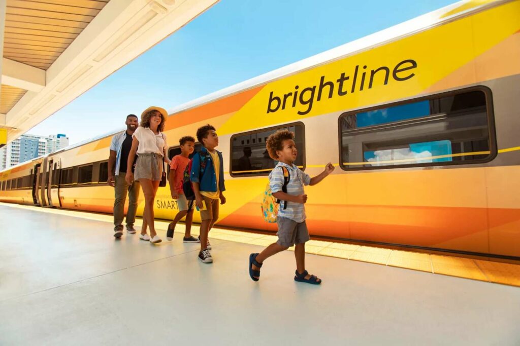 Family aboard the brightline from the Aventura, Florida station to Orlando